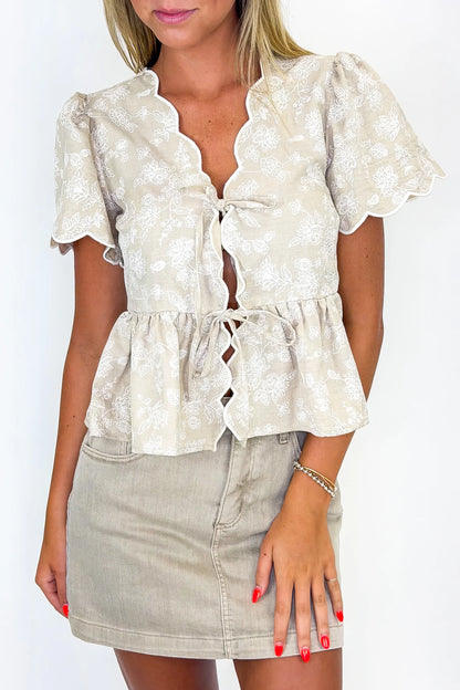 The Bloom Tie Embroidered Scalloped Peplum Top